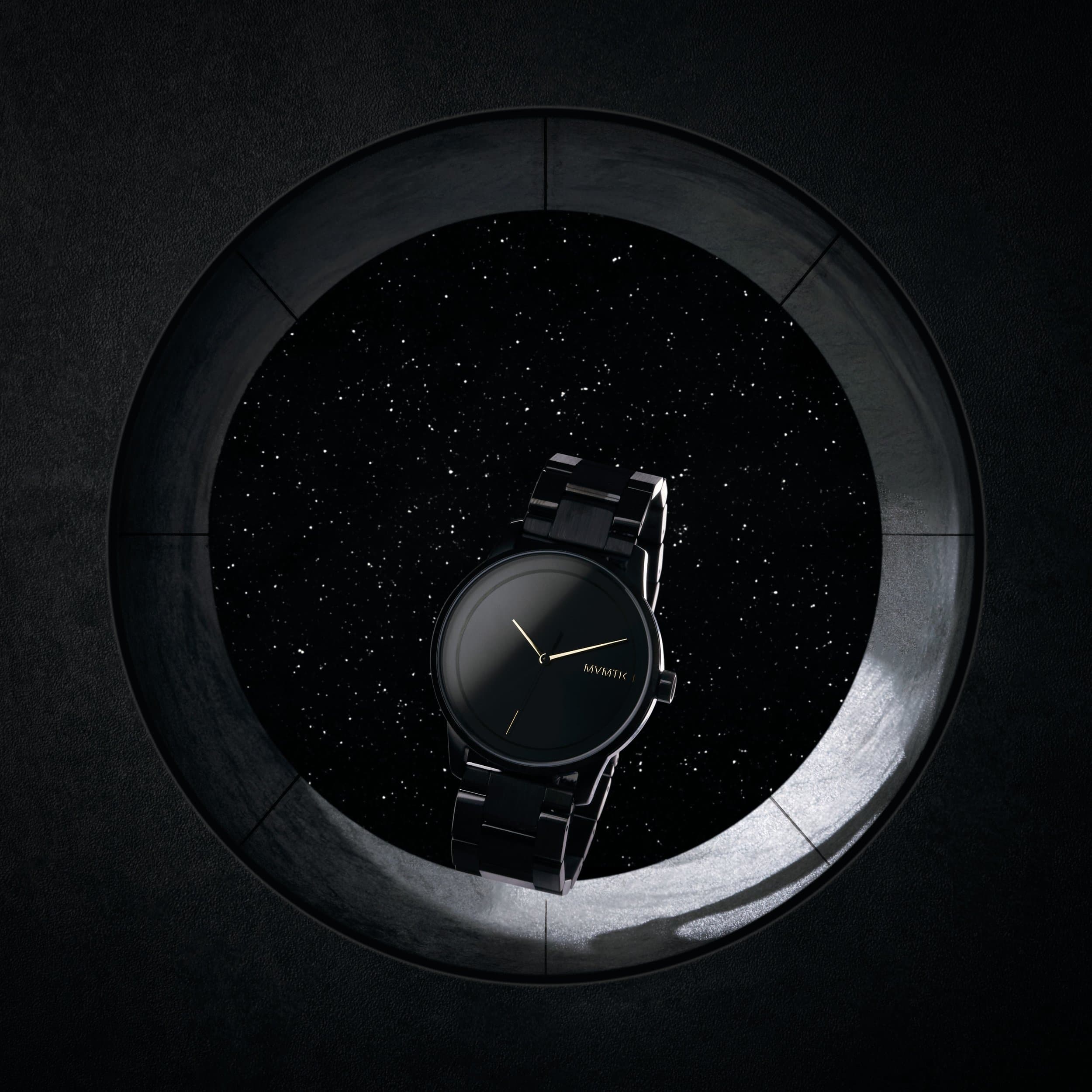 A black watch with gold hands framed in a circular porthole against a star field